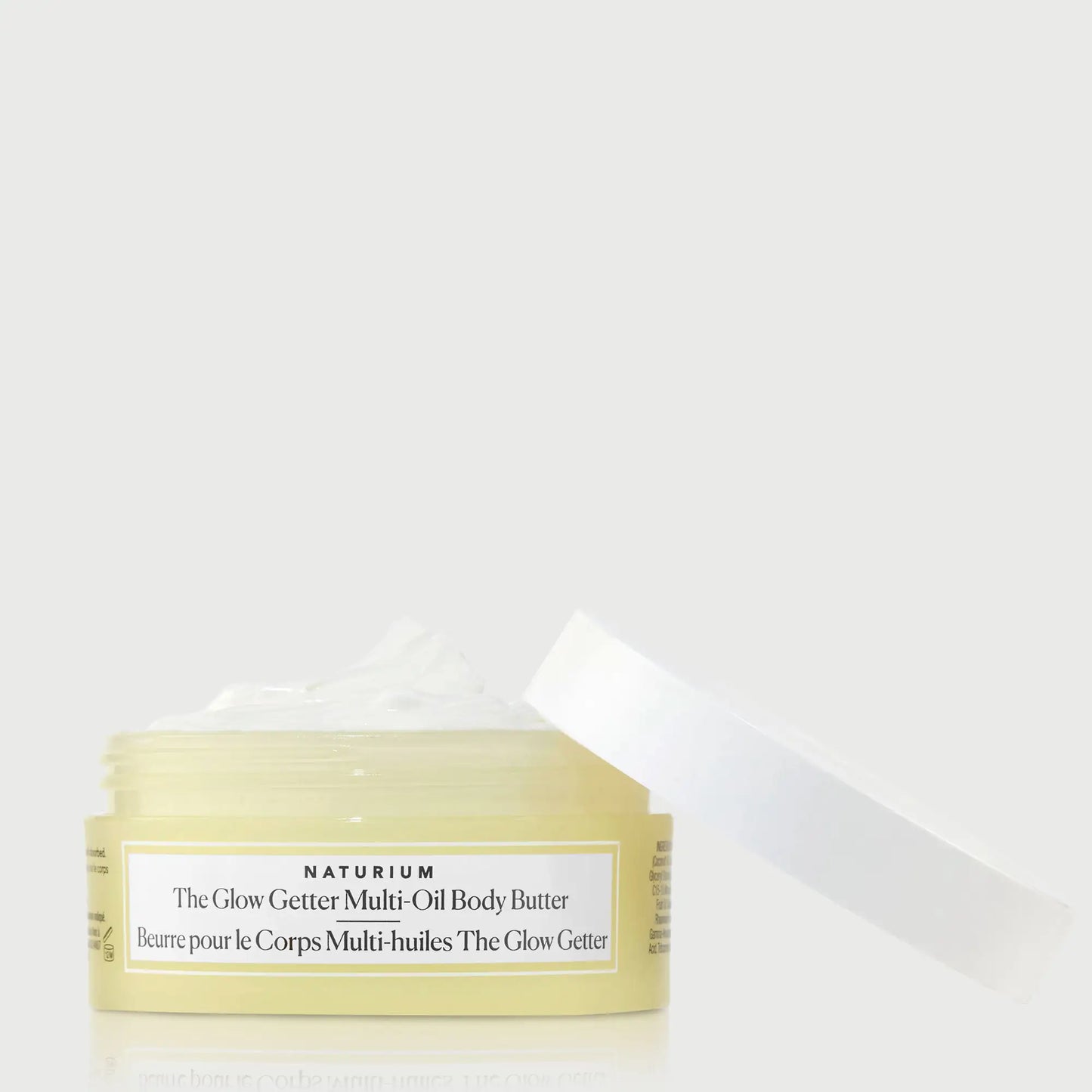 the-glow-getter-multi-oil-body-butter-travel-size-r0 NATR-40115_Glow-Getter-Body-Butter-Mini_front_capoff_bonebkgd.webp