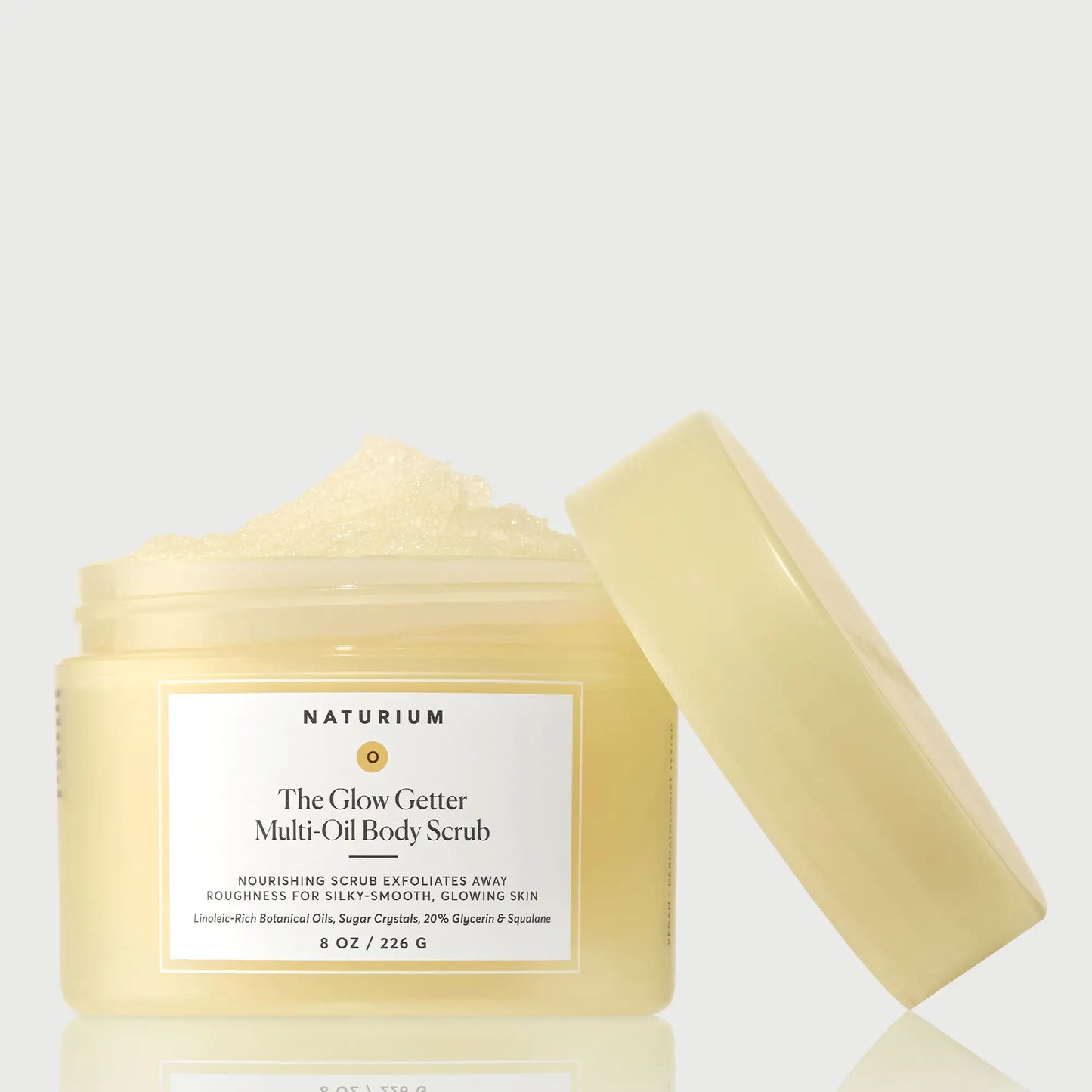 the-glow-getter-multi-oil-body-scrub-g1 NATR-40028-GlowGetter-Multi-Oil-Body-Scrub-Front-CapOff-bonebkgd.webp