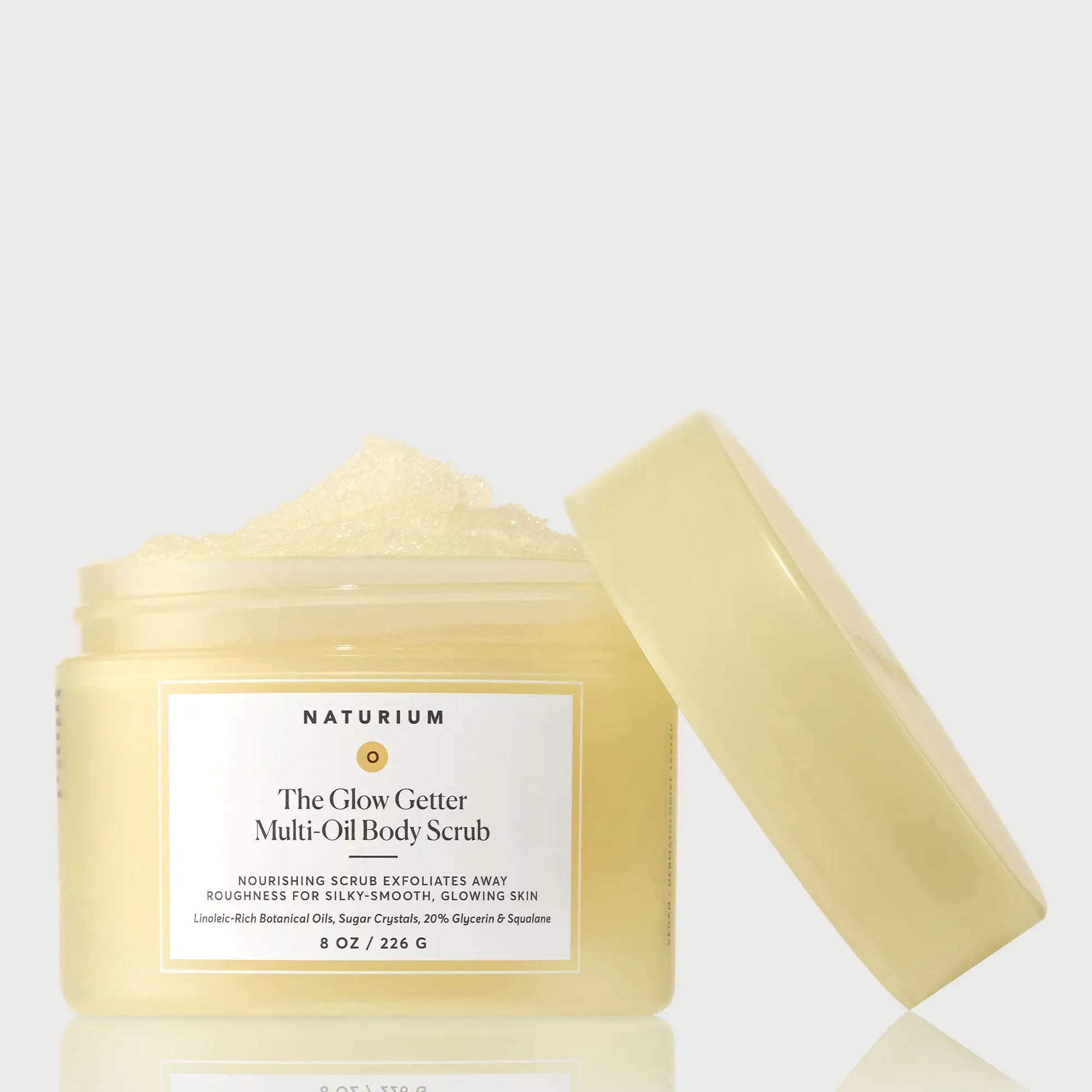 the-glow-getter-multi-oil-body-scrub-g1 NATR-40028-GlowGetter-Multi-Oil-Body-Scrub-Front-CapOff-bonebkgd.webp