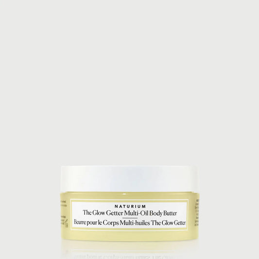 the-glow-getter-multi-oil-body-butter-travel-size-r0 NATR-40115_Glow-Getter-Body-Butter-Mini_front_capon_bonebkgd.webp